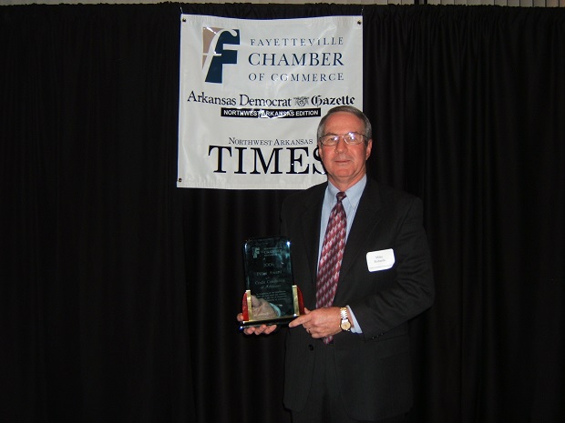 Mike Robards, Former Executive Director, accepting the City of Fayetteville’s Pillar Award on behalf of CCOA.