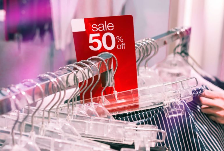 A sale rack in a clothing store.