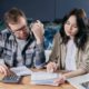 A couple reviewing their finances together.