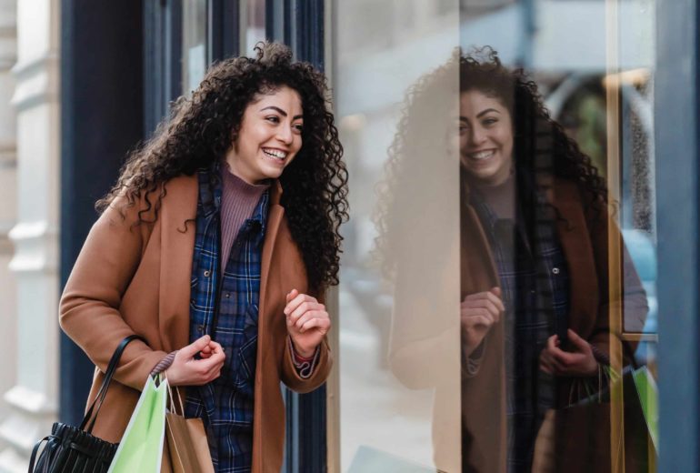 A woman window shopping.