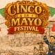 Illustrated Cinco de Mayo Festival scene with colorful bunting, soldiers with a cannon on the left, and historic figures celebrating near a Mexican flag center stage.